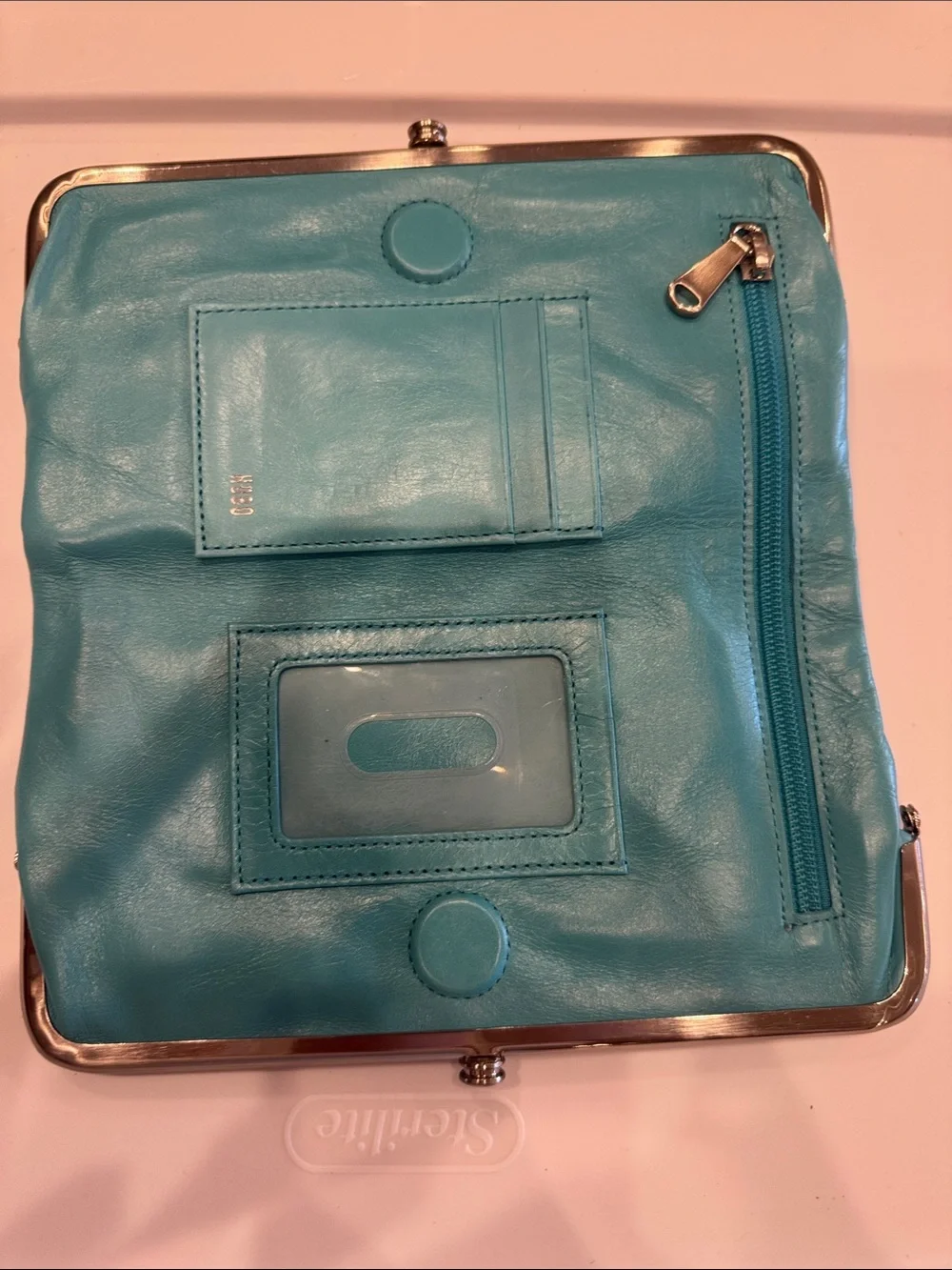 HOBO Turquoise Leather Frame Clutch
